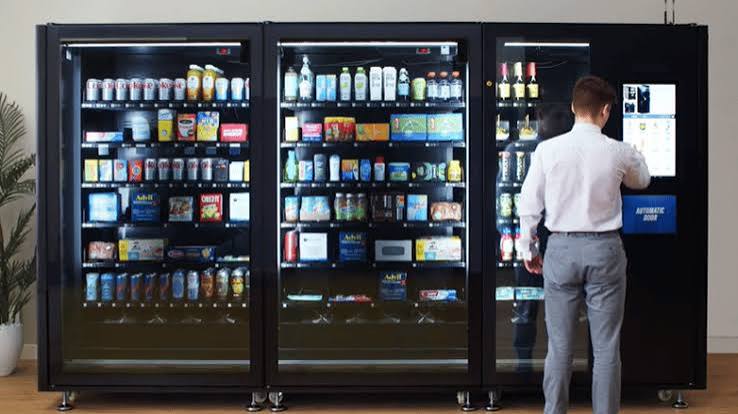 Wall of premium glass-front smart vending machines with touchscreen